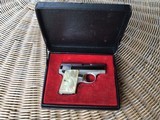 BROWNING BELGIUM BABY 25 AUTO, BRIGHT NICKEL WITH PEARLITE GRIPS, NEW IN THE BOX
