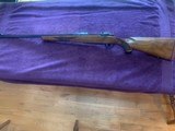 RUGER 77RS 300 WIN. MAG. CAL., DESIRABLE TANG SAFETY & RED RUGER PAD, 24” BARREL, FRONT HOOD & REAR SIGHT REMOVED, RINGS INCLUDED, EXC. COND. - 1 of 5