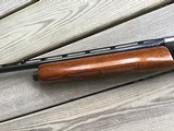 REMINGTON 1100 LW., 28 GA. 25” MOD. VENT RIB, EARLY MFG. WITH MAHOGANY WOOD 99+% COND. - 7 of 7
