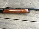 REMINGTON 1100 LW., 28 GA. 25” MOD. VENT RIB, EARLY MFG. WITH MAHOGANY WOOD 99+% COND. - 6 of 7