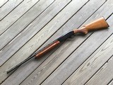 REMINGTON 1100 LW., 28 GA. 25” MOD. VENT RIB, EARLY MFG. WITH MAHOGANY WOOD 99+% COND.