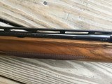 REMINGTON 1100, 410 GA., 25” MOD. VENT RIB, FACTORY ENGRAVED RECEIVER WITH QUAIL & POINTER ON ONE SIDE, SETTER & QUAIL ON THE OTHER SIDE, 99+% COND. - 7 of 8