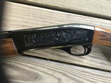 REMINGTON 1100, 410 GA., 25” MOD. VENT RIB, FACTORY ENGRAVED RECEIVER WITH QUAIL & POINTER ON ONE SIDE, SETTER & QUAIL ON THE OTHER SIDE, 99+% COND. - 6 of 8