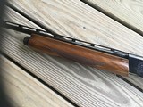 REMINGTON 1100, 410 GA., 25” MOD. VENT RIB, FACTORY ENGRAVED RECEIVER WITH QUAIL & POINTER ON ONE SIDE, SETTER & QUAIL ON THE OTHER SIDE, 99+% COND. - 8 of 8