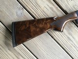 REMINGTON 1100 SPORTING 28 GA. 28” BARREL,LIKE NEW WITH GORGEOUS BURL WALNUT, COMES WITH 4 BRILEY CHOKE TUBES - 4 of 10