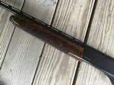 REMINGTON 1100 SPORTING 28 GA. 28” BARREL,LIKE NEW WITH GORGEOUS BURL WALNUT, COMES WITH 4 BRILEY CHOKE TUBES - 10 of 10