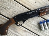 REMINGTON 1100 SPORTING 28 GA. 28” BARREL,LIKE NEW WITH GORGEOUS BURL WALNUT, COMES WITH 4 BRILEY CHOKE TUBES - 9 of 10
