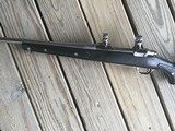RUGER 77, 22-250 CAL., 22” BARREL, STAINLESS WITH SKELETON BOAT PADDLE STOCK, EXC. COND. - 5 of 6