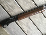 REMINGTON 1100 LW, 410 GA., 25” FULL CHOKE, VENT RIB, 3” CHAMBER, 99% COND. HAS ONE DING ON THE FOREARM NEAR CHECKERING - 4 of 9