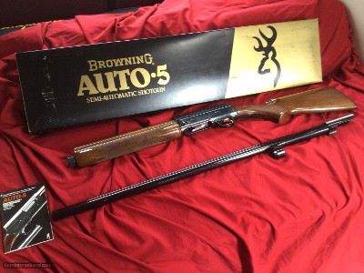 BROWNING A-5, 12 GA. 2 3/4”, 30” VENT RIB
FULL CHOKE NEW UNFIRED IN THE BOX, WITH COSMOLINE ON THE GUN & BARREL MAKING THEM LOOK BLURRY