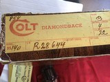 COLT DIAMONDBACK 22 LR. 4” BLUE, NEW UNFIRED IN THE BOX WITH OWNERS, MANUAL, HANG TAG, COLT LETTER, COLT SCREW DRIVER & OTHER PAPERS THAT CAME IN BOX - 6 of 6