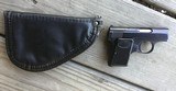 BROWNING BABY 25 AUTO, NEW COND. WITH BROWNING POUCH - 2 of 2
