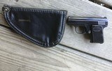 BROWNING BABY 25 AUTO, NEW COND. WITH BROWNING POUCH