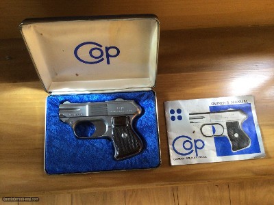 COP 357 MAGNUM 4 SHOT STAINLESS STEEL PISTOL, LIKE NEW IN THE PLIP TOP BOX WITH OWNERS MANUAL