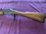SAVAGE 24C, CAMPER COMPANION 22LR. OVER 20 GA. 20” BARREL, WITH STORAGE IN THE STOCK, BLUE & CASE COLOR 99%, WOOD HAS A FEW FLAKE SPOTS - 3 of 5