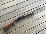 Remington 1100, 410 GA. 25” MOD. CHOKE, FACTORY ENGRAVED WITH ENGLISH SETTER & QUAIL ON ONE SIDE & ENGLISH POINTER & QUAIL IN FLIGHT ON THE OTHER SIDE