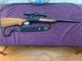 HARRINGTON & RICHARDSON ULTRA SLUG 20 GA., LAMINATE STOCK,FULLY RIFLED, 3” CHAMBER BARREL, BUSHNELL 1 3/4” X—3X SCOPE,EXC. COND. - 1 of 5