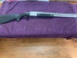 RUGER RED LABEL, 12 GA.. 26” CHOKE TUBE BARREL ALL WEATHER, FACTORY ENGRAVED RECEIVER WITH ENGRAVED GOLD DUCKS IN FLIGHT EXC. COND - 1 of 5