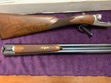 RUGER GOLD LABEL 12 GA., 28” BARRELS,, ENGLISH STOCK, NEW UNFIRED 100% COND. IN THE BOX WITH OWNERS MANUAL, 5 CHOKE TUBES & WRENCH - 4 of 5