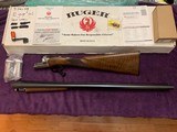 RUGER GOLD LABEL 12 GA., 28” BARRELS,, ENGLISH STOCK, NEW UNFIRED 100% COND. IN THE BOX WITH OWNERS MANUAL, 5 CHOKE TUBES & WRENCH