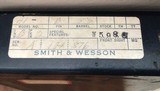 SMITH & WESSON 41 NO DASH, 22 LR., 5 1/2” BARREL, NEW UNFIRED IN THE BOX WITH OWNERS MANUAL, CLEANING TOOLS IN PLASTIC, OIL PAPER ETC. - 4 of 9
