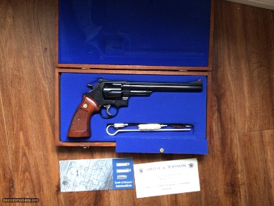 SMITH & WESSON 57 NO DASH, 41 MAGNUM, 8 3/8” BLUE, AS NEW IN THE WOOD PRESENTATION CASE WITH CLEANING TOOLS, OWNERS MANUAL, ETC.