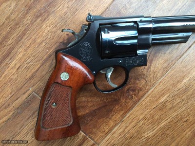 SMITH & WESSON 57 NO DASH, 41 MAGNUM, 8 3/8” BLUE, AS NEW IN THE WOOD PRESENTATION CASE WITH CLEANING TOOLS, OWNERS MANUAL, ETC. - Image 3 of 7