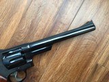 SMITH & WESSON 57 NO DASH, 41 MAGNUM, 8 3/8” BLUE, AS NEW IN THE WOOD PRESENTATION CASE WITH CLEANING TOOLS, OWNERS MANUAL, ETC. - 5 of 7
