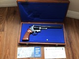 SMITH & WESSON 57 NO DASH, 41 MAGNUM, 8 3/8” BLUE, AS NEW IN THE WOOD PRESENTATION CASE WITH CLEANING TOOLS, OWNERS MANUAL, ETC. - 2 of 7