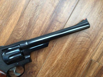 SMITH & WESSON 57 NO DASH, 41 MAGNUM, 8 3/8” BLUE, AS NEW IN THE WOOD PRESENTATION CASE WITH CLEANING TOOLS, OWNERS MANUAL, ETC. - Image 5 of 7