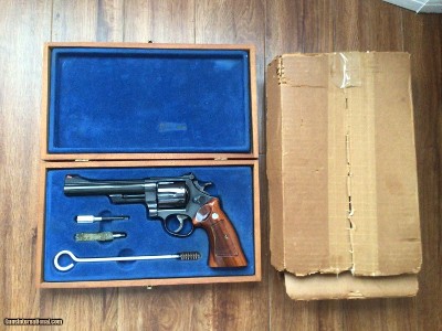 SMITH & WESSON 57 NO DASH, 41 MAGNUM 6” BLUE, IN THE SMITH WOOD PRESENTATION CASE WITH CLEAING TOOLS, ALSO COMES IN THE FACTORY SHIPPING CARTON