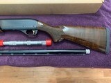 REMINGTON 1100 SPORTING,12 GA., 28” REM CHOKE,HIGH GLOSS WALNUT,
NEW UNFIRED IN THE BOX WITH OWNERS MANUAL, 3 CHOKE TUBES & WRENCH - 4 of 6