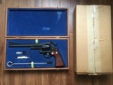 SMITH & WESSON 27-2, 357 MAGNUM 8 3/8” BARREL NEW IN THE WOOD PRESENTATION CASE WITH CLEANING TOOLS, COMES WITH FACTORY SHIPPING CARTON - 1 of 9