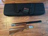 RUGER RED LABEL “50TH ANNIVERSARY”, 28 GA., 26” BARRELS, WITH 3 CHOKE TUBES & WRENCH 99+++% COND. IN RUGER CASE