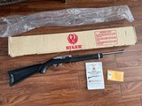 RUGER 10-22, 22 LR. WITH BOAT PADDLE STOCK, STAINLESS STEEL AS NEW IN THE BOX WITH OWNERS MANUAL, ETC.
