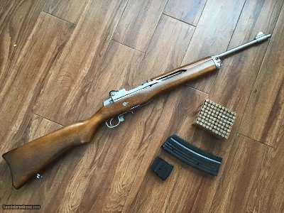 RUGER MINI-14, 223 CAL. MFG. 1980, 99% COND. COME WITH RUGER REGULAR, MAG. & 30 ROUND AFTER MARKET MAG. & 80 ROUNDS OF 223 CAL RELOADS