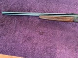 SAVAGE 24, 22 LR. OVER 410 GA., HAS THE POPULAR SIDE BUTTON BARREL SELECTOR, WALNUT WOOD, CASE COLOR RECEIVER99% COND. - 4 of 5