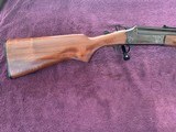 SAVAGE 24, 22 LR. OVER 410 GA., HAS THE POPULAR SIDE BUTTON BARREL SELECTOR, WALNUT WOOD, CASE COLOR RECEIVER99% COND. - 1 of 5