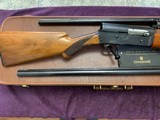 BROWNING A-5, LT-12, 12 GA., 2 BARREL SET, 26”
IMPROVED CYLINDER VENT RIB & 30” FULL CHOKE, EXC. COND. IN BROWNING HARD CASE WITH
OWNERS MANUAL - 4 of 5