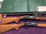 REMINGTON 1100 MATCHED SKEET SET, 28 GA. & 410, MFG. 1969, 25” SKEET CHOKES, EXC. COND. COMES IN ORIGINAL REMINGTON GREEN CASE WITH WEIGHTS - 2 of 5