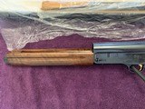 BROWNING A-5 12 GA., 3” MAGUNUM, 26” INVECTOR. BEAUTIFUL WOOD, MFG. 1990, NEW IN THE BOX WITH OWNERS MANUAL, IN COSMOLINE
IN FACTORY
COSMOLINE - 5 of 6