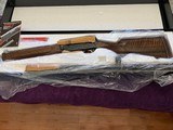 BROWNING A 5 12 GA., 3
MAGUNUM, 26
INVECTOR. BEAUTIFUL WOOD, MFG. 1990, NEW IN THE BOX WITH OWNERS MANUAL, IN COSMOLINE
IN FACTORY
COSMOLINE