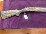 RUGER RED LABEL, RARE FACTORY ALL WEATHER, FACTORY CAMO, 28
BARRELS, 99% COND