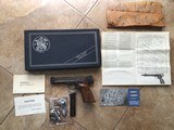SMITH & WESSON 41, 22 LR. RARE 5” BARREL, NOT TO BE CONFUSED WITH 5 1/2” BARREL, AS NEW IN THE BOX WITH ORIGINAL EXTRA MAG.