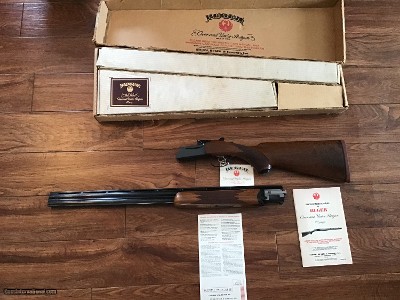 RUGER RED LABEL 20 GA. 26” IMPROVED CYLINDER & MODIFIED, GORGEOUS WALNUT WOOD & BLUE
RECEIVER, IN THE BANJO BOX WITH OWNERS MANUAL, HANG TAG, ETC.