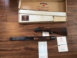 RUGER RED LABEL 20 GA. 26” IMPROVED CYLINDER & MODIFIED, GORGEOUS WALNUT WOOD & BLUE RECEIVER, IN THE BANJO BOX WITH OWNERS MANUAL, HANG TAG, ETC. - 1 of 9
