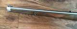 RUGER 10-22, 22LR. INTERNATIONAL CHECKERED
MANLICHER WALNUT STOCK, STAINLESS STEEL, NEW UNFIRED IN THE BOX WITH OWNERS MANUAL, ETC. - 4 of 8