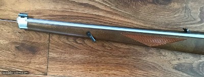 RUGER 10-22, 22LR. INTERNATIONAL CHECKEREDMANLICHER WALNUT STOCK, STAINLESS STEEL, NEW UNFIRED IN THE BOX WITH OWNERS MANUAL, ETC. - Image 4 of 8