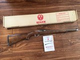 RUGER 10-22, 22 LR., MANLICHER, INTERNATIONAL WALNUT STOCK, STAINLESS STEEL, NEW IN THE BOX WITH OWNERS MANUAL, ETC.