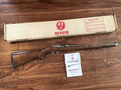 RUGER 10-22, 22 LR., MANLICHER, INTERNATIONAL WALNUT STOCK, STAINLESS STEEL, NEW IN THE BOX WITH OWNERS MANUAL, ETC.